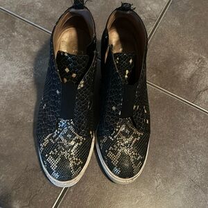 Paolo side zip wedge booties. Snake skin pattern black and gold